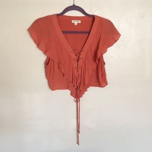 Orange ruffle crop top